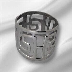 Avant Garde 1970s Silver Bracelet with Cut Outs and Clamper Hinge - 2.25 In High